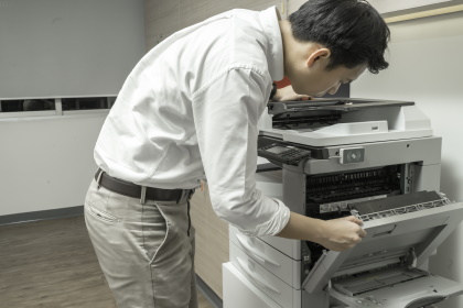 man searching printer